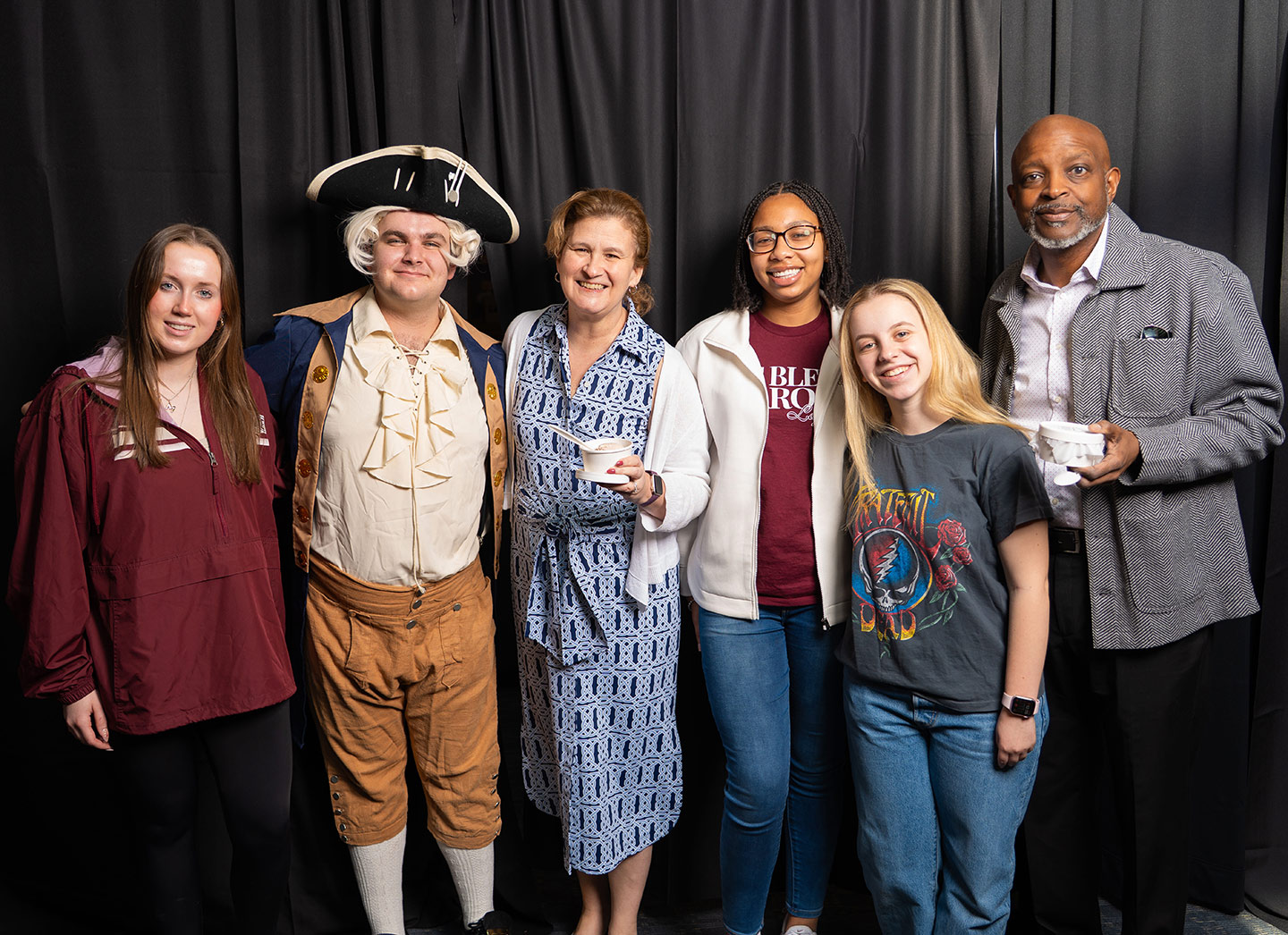 Photo of the Lafayette community members with a historical interpreter of the Marquis de Lafayette
