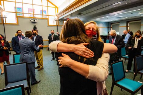 Hannah Tatu hugs Nicole Hurd