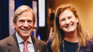 Nicole Hurd and Peter Grauer smile