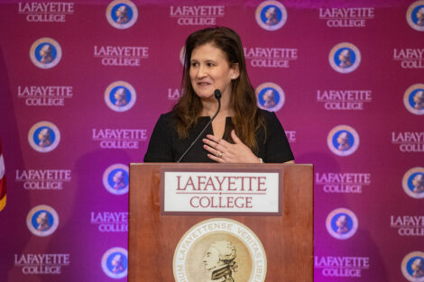 Nicole Hurd speaks at podium in Marlo Room