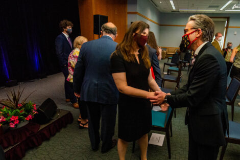 Nicole Hurd shakes John O'Keefe's hand