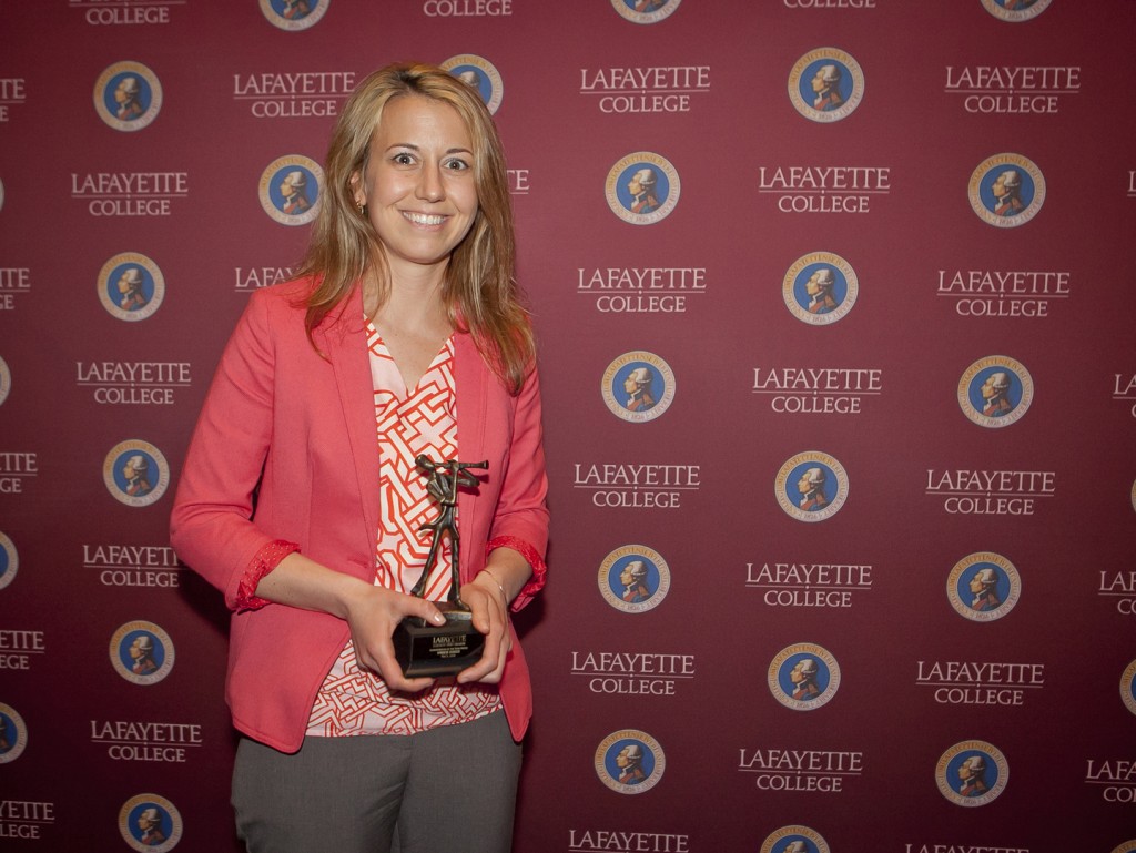 Amber Zuber holds her 2016 Administrator of the Year Award.